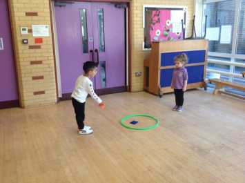 Nursery practise throwing and catching