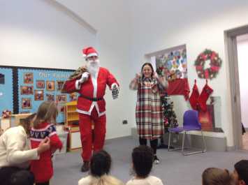 A special visitor comes to the Nursery Christmas Party