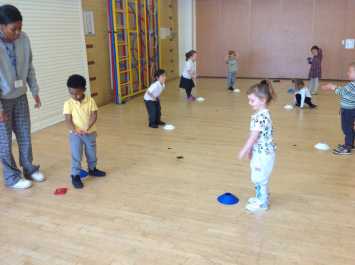 Nursery practise throwing and catching