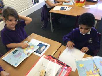 1L discover that the world is at their fingertips with an atlas!